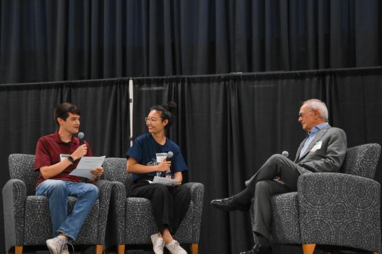 President Rafael Reif on stage, answering questions at Graduate Student Orientation 2022